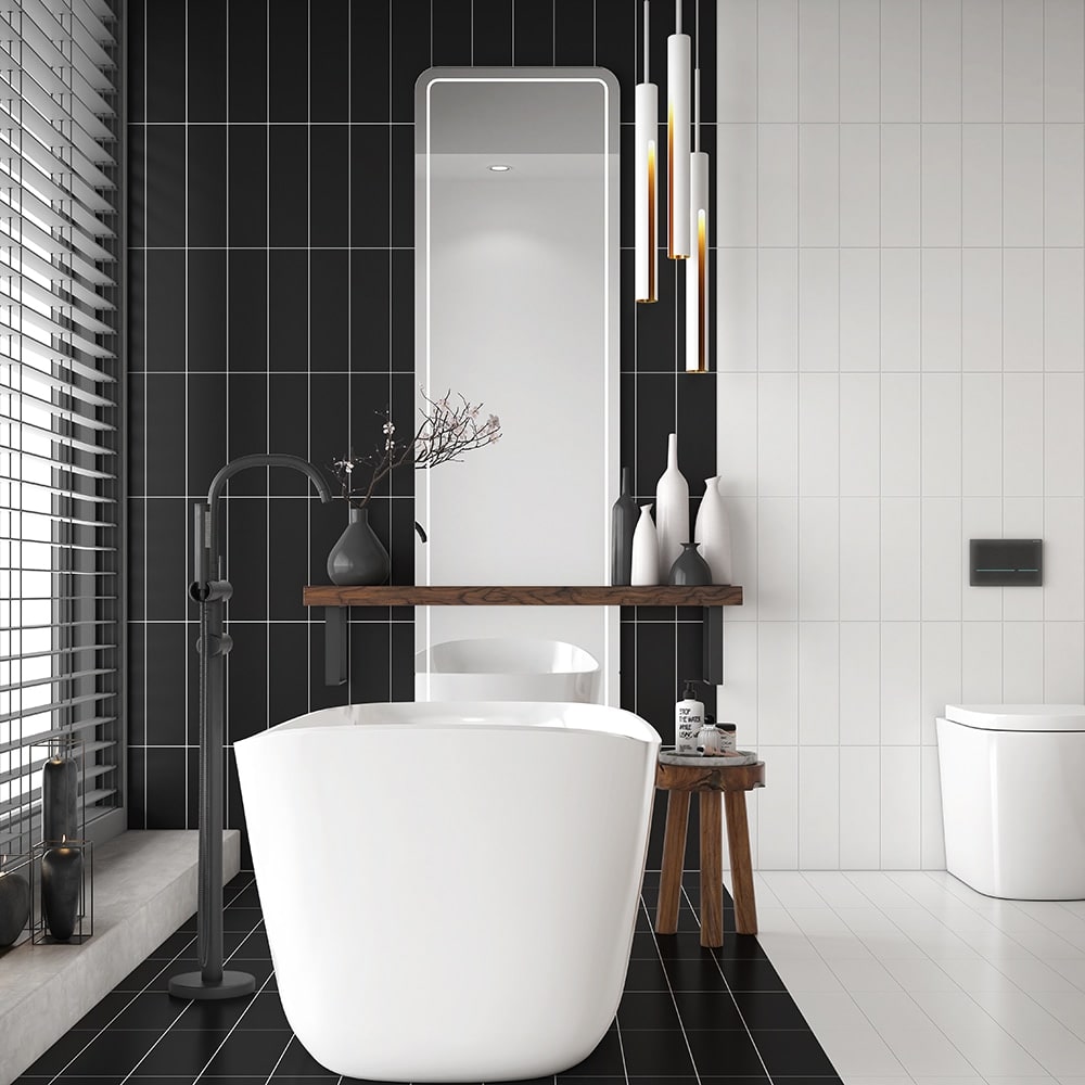 Modern black and white bathroom with white vertical shower wall tile.