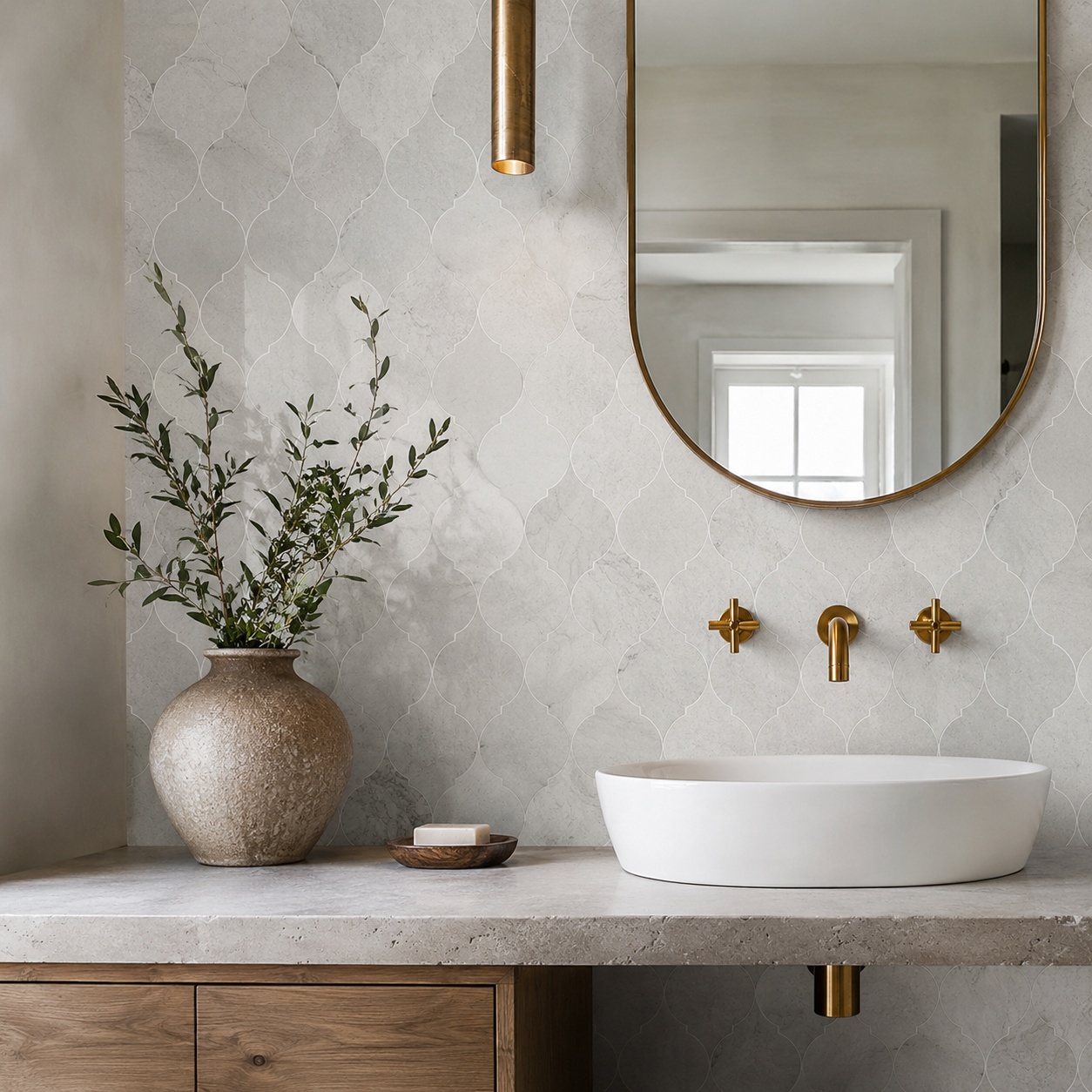sophisticated bathroom featuring a gray honed limestone mosaic tile accent wall