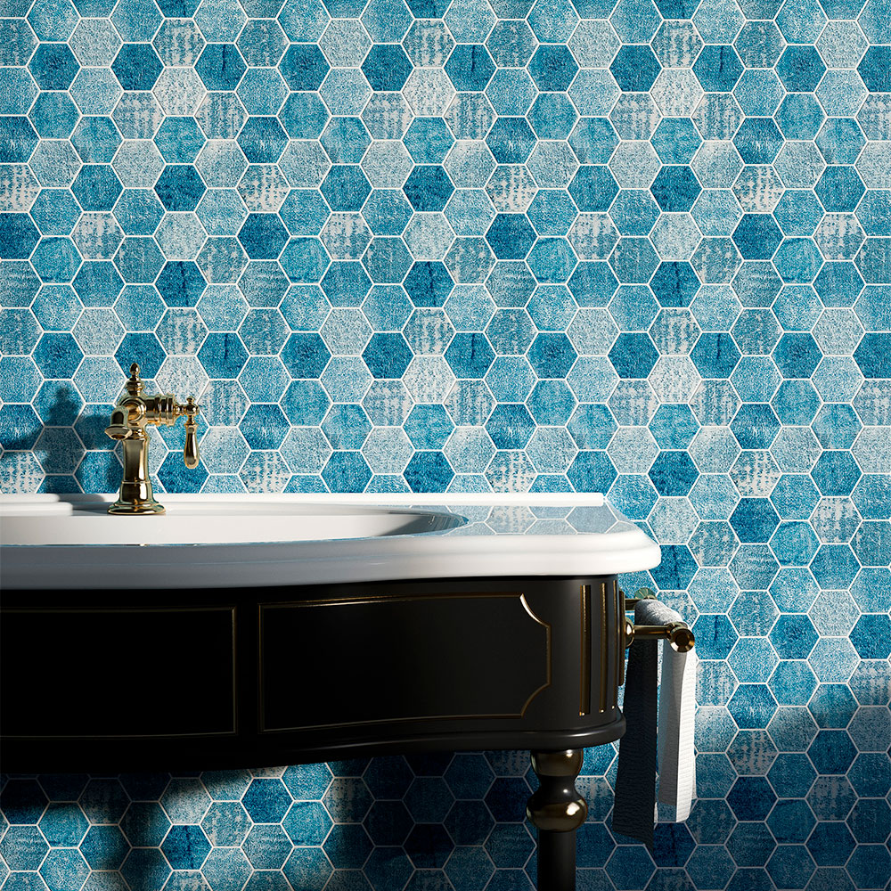 A stylish bathroom vanity featuring vibrant blue hexagon mosaic tiles.